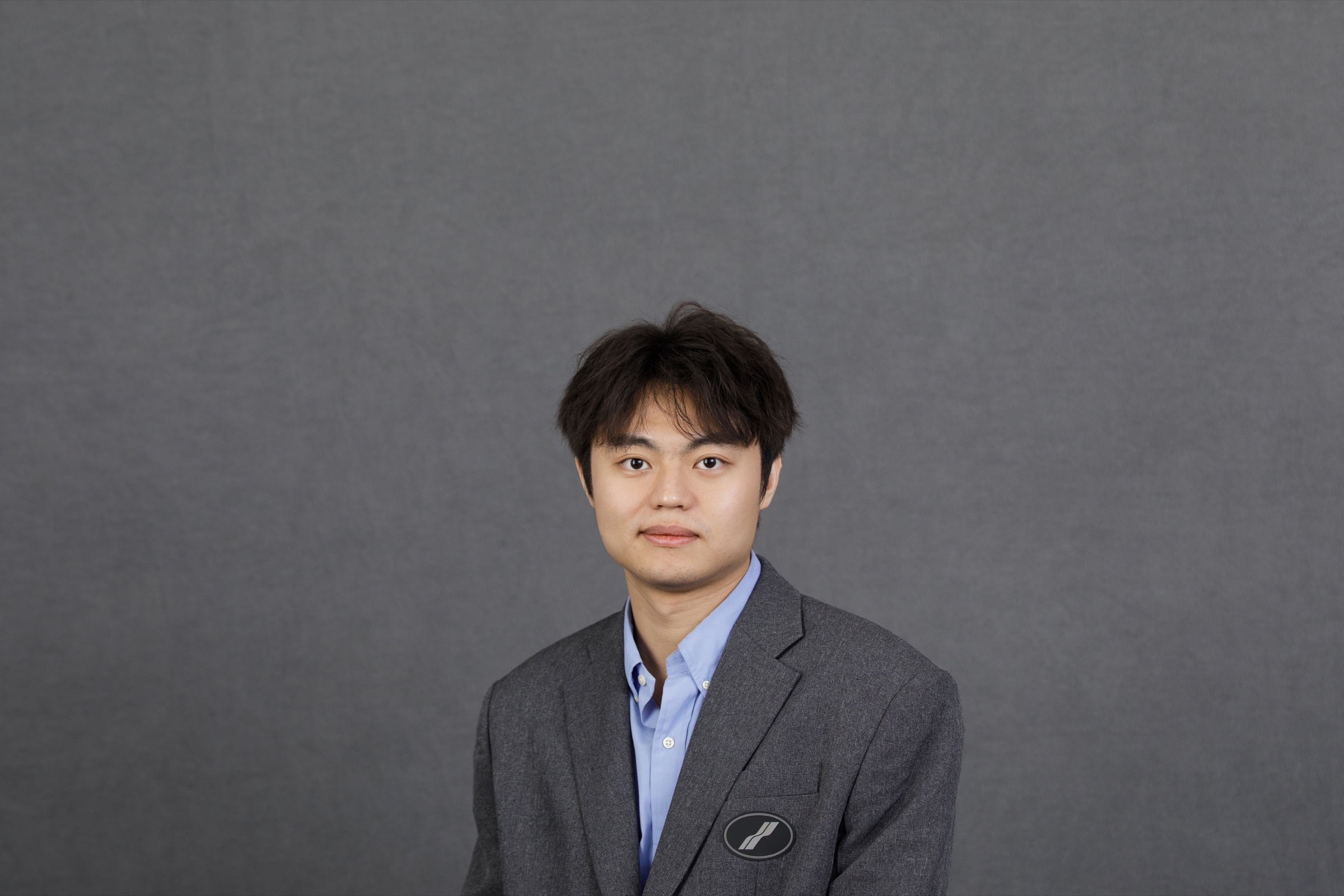 Professional portrait of Evan Ruiyang Sun